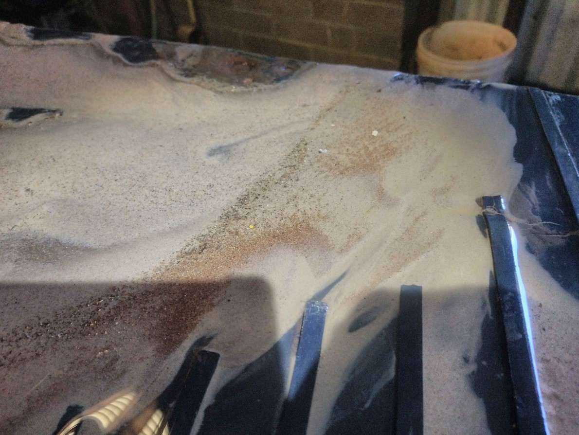 Photo 1. Striation of Gold, Zinc, and other Metals on the Deister Table – Bishop Gold Mill