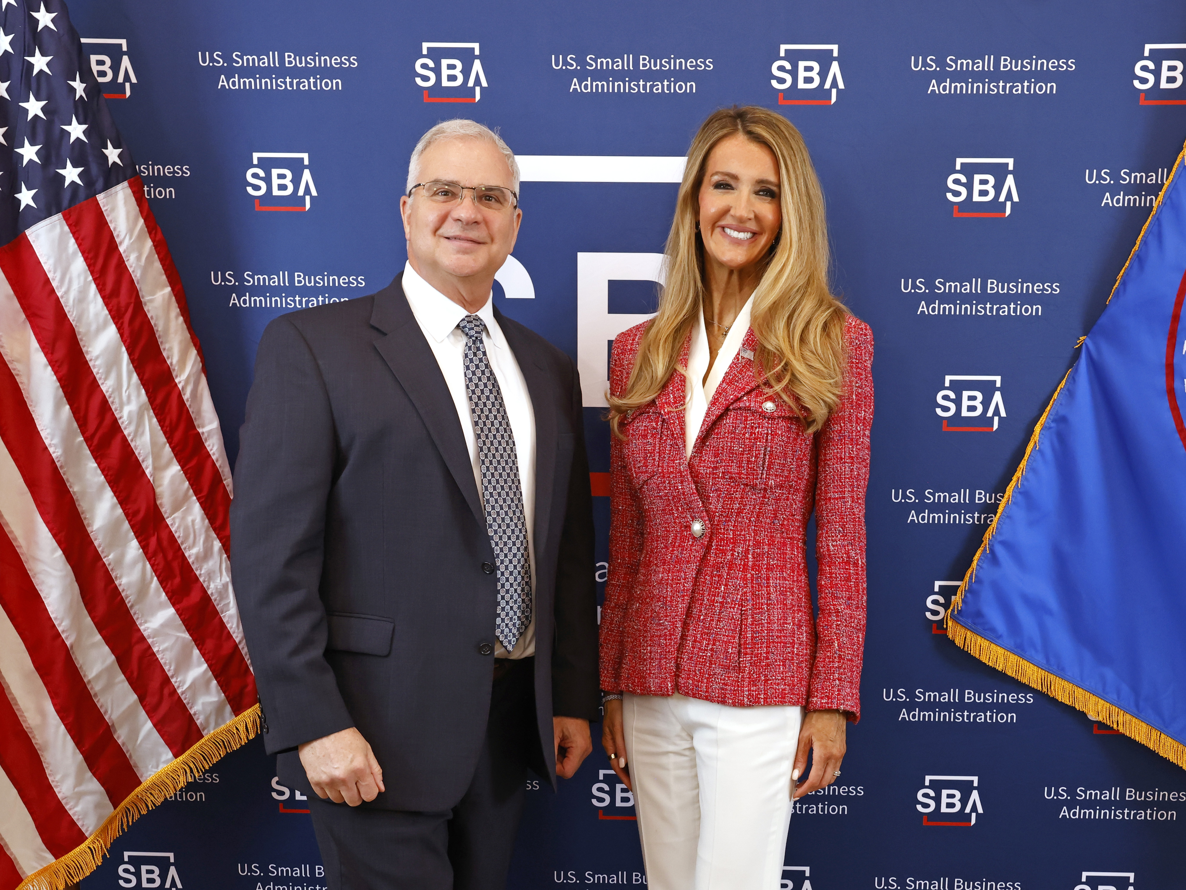 RGS President and CEO Col. Tony Martinez receives award by SBA Administrator Kelly Loeffler.