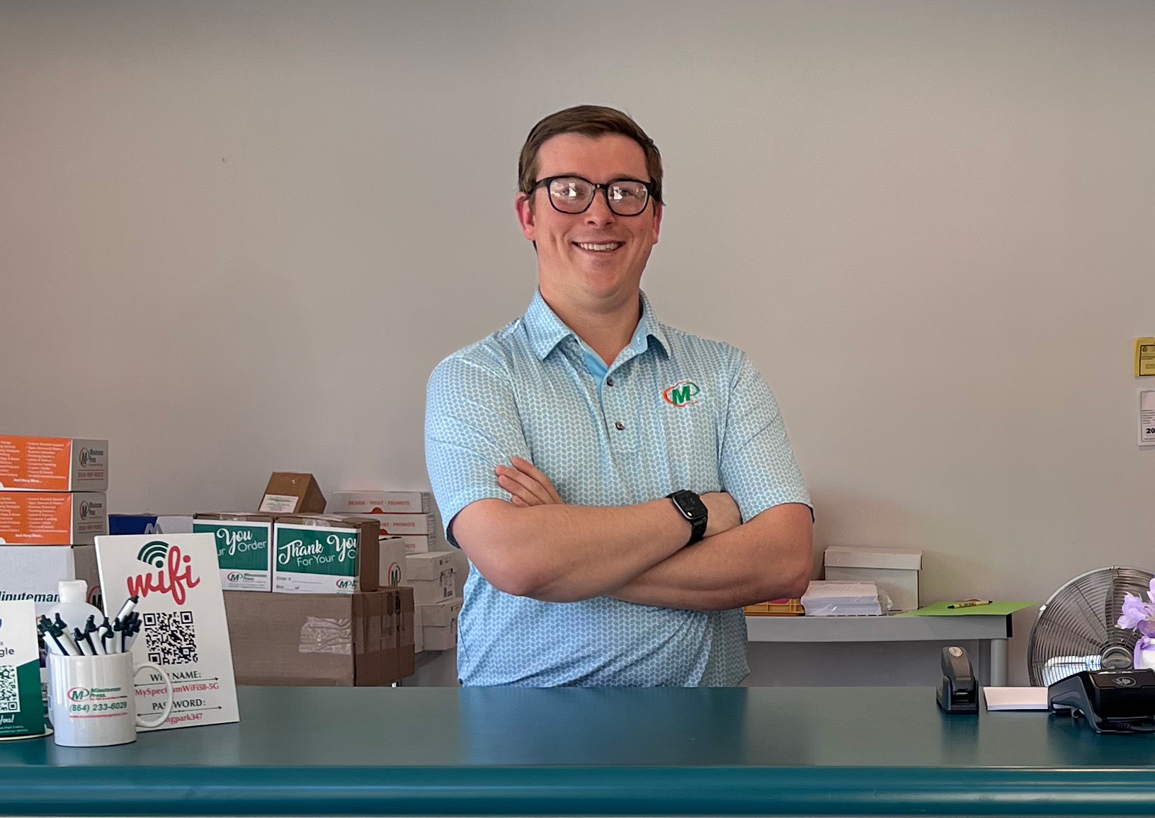 Minuteman Press Franchise Owner Corey Sanders at his center in Greenville, SC.